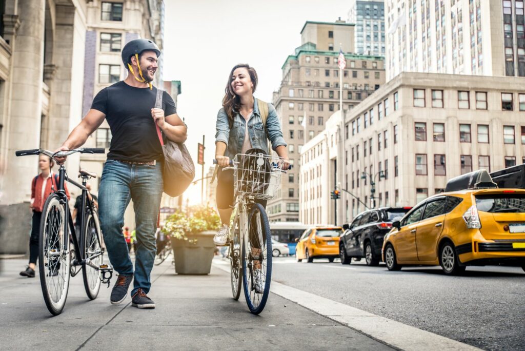 Couple cycling in New York, USA, american bike brands.
