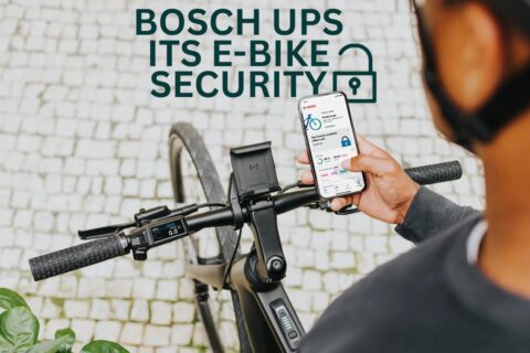 Man with Phone Showing Bosch E-Bike Security Updates
