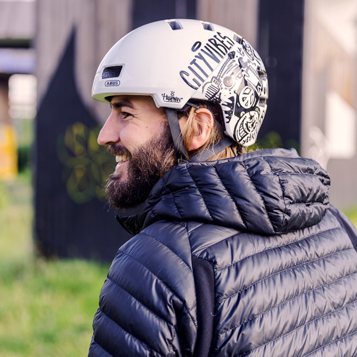 Man wearing Abus bicycle helmet