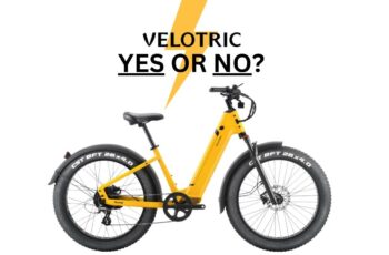 Yellow Velotric bicycle with Velotric logo
