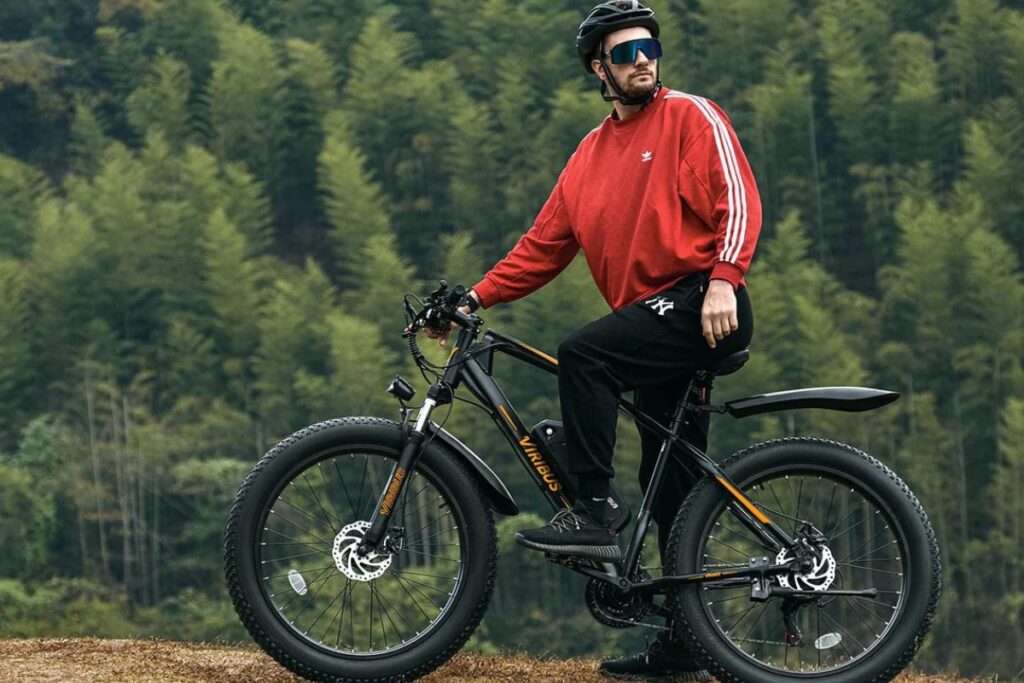 Man in woods with Viribus bicycle