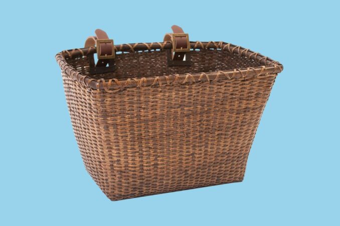 retrospec toto hand woven cane basket blue background