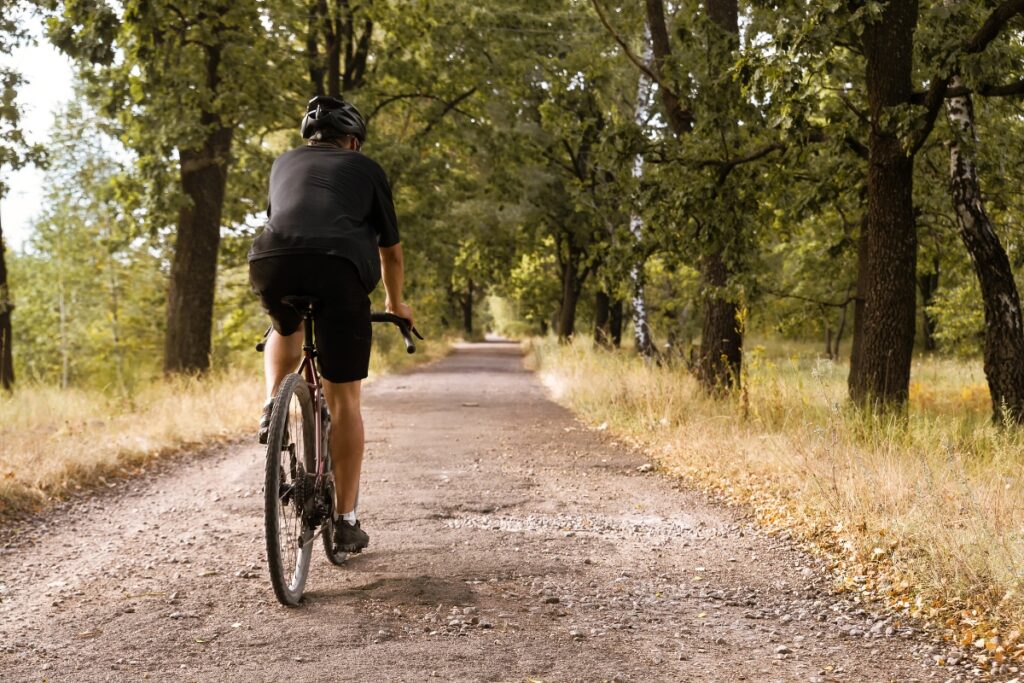 Man riding a gravel bike in the countryside