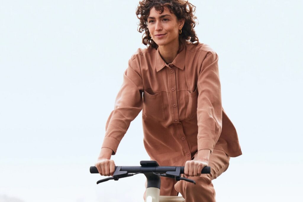 woman riding Cowboy e-bike