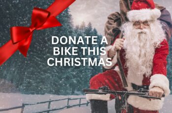 Santa Claus riding a bicycle