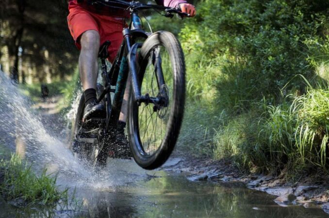 alpkit rana waterproof cycling sock in use