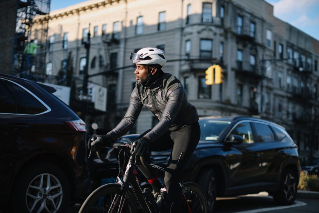 Man cycling through New York City