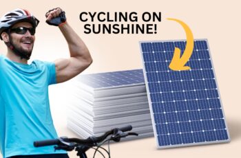 CYCLIST IN FRONT OF SOLAR PANELS