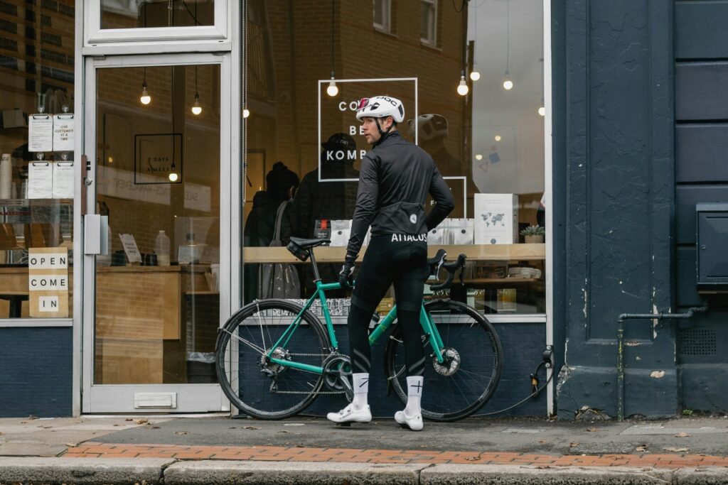 Cyclist outside cafe