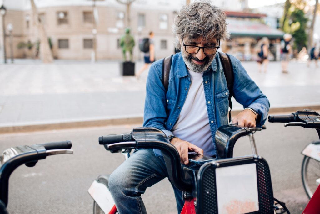 mature man with e-bike