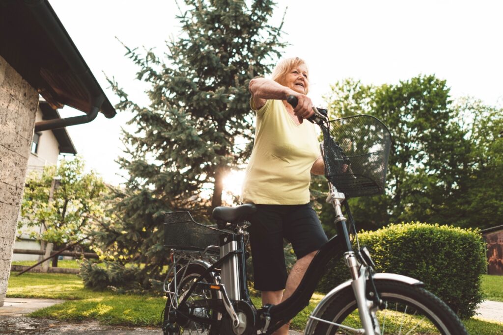 mature woman with e-bike